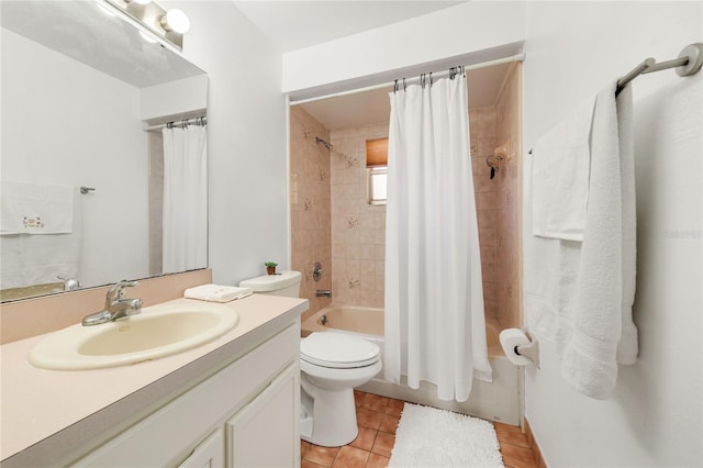 full bathroom featuring shower / bath combination with curtain, vanity, tile patterned floors, and toilet