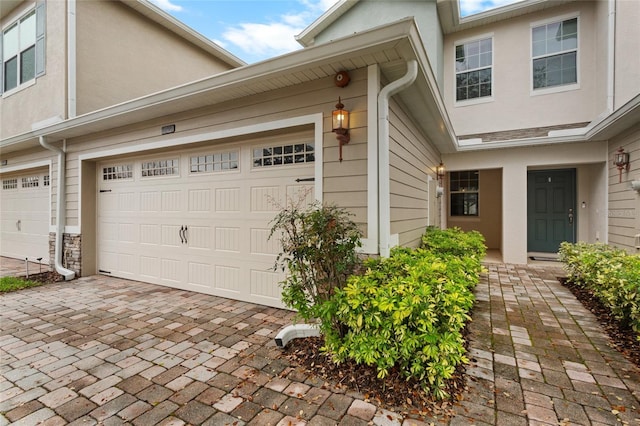 exterior space with decorative driveway