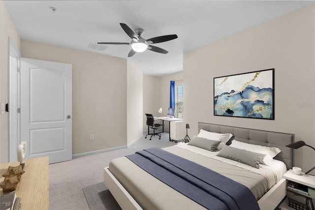 bedroom featuring light carpet, ceiling fan, visible vents, and baseboards