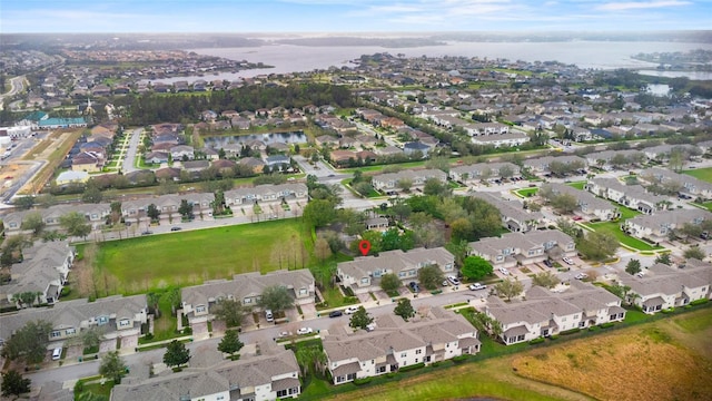 aerial view featuring a water view and a residential view