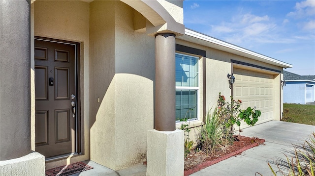 property entrance with a garage