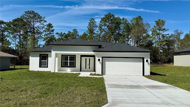 view of front facade featuring a garage, concrete driveway, a front yard, and stucco siding