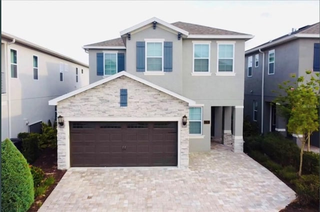 view of front of property with a garage