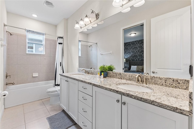 full bathroom featuring tile patterned flooring, vanity, toilet, and shower / tub combo with curtain