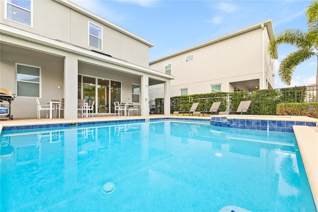 view of pool with a patio