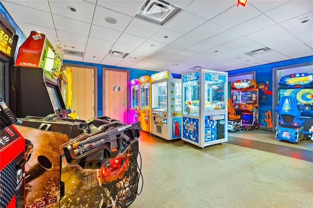 playroom featuring a paneled ceiling