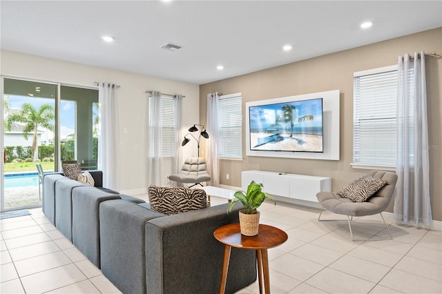 living room with light tile patterned floors