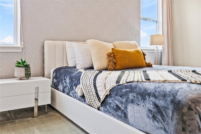 bedroom featuring tile walls