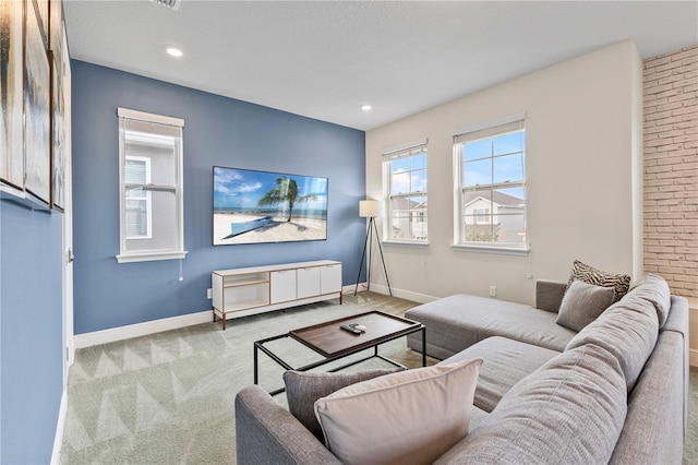 living room featuring light carpet