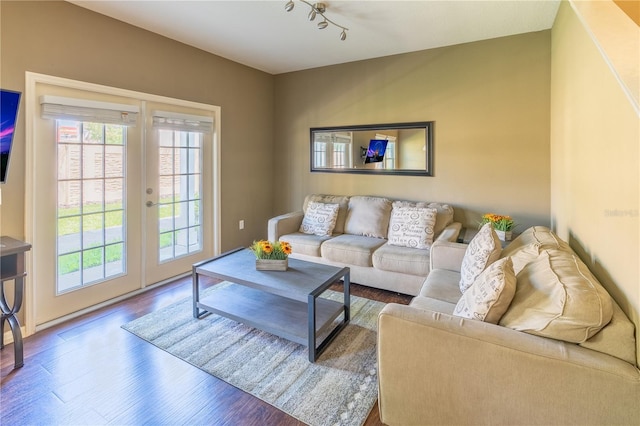 living room featuring hardwood / wood-style flooring and french doors