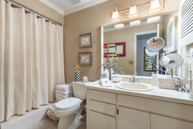 bathroom featuring ornamental molding, toilet, tile patterned flooring, and vanity