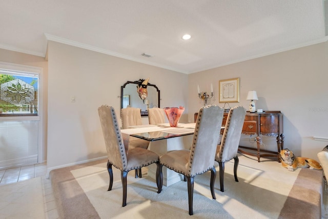 tiled dining area with crown molding