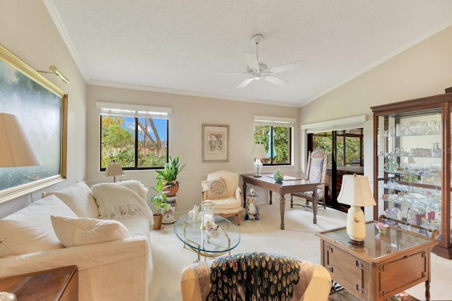 carpeted living room featuring crown molding, ceiling fan, vaulted ceiling, and a textured ceiling