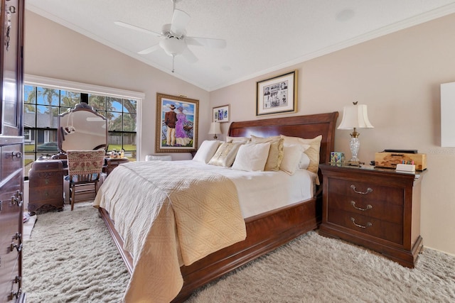 carpeted bedroom with crown molding, ceiling fan, access to exterior, and vaulted ceiling