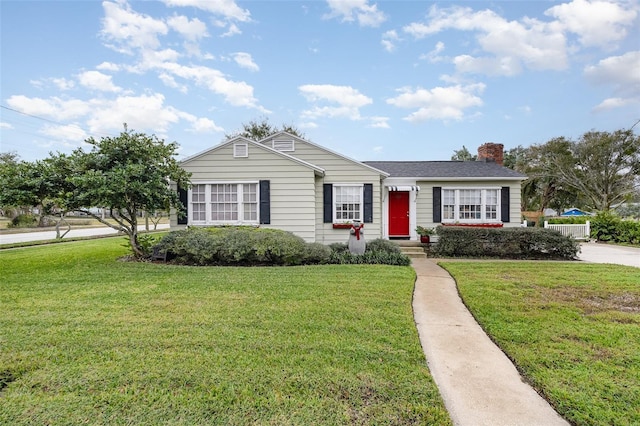 single story home with a front yard