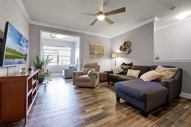 living room with ceiling fan, crown molding, dark hardwood / wood-style floors, and a textured ceiling