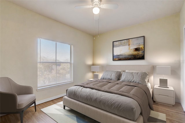 bedroom featuring ceiling fan and light wood-type flooring