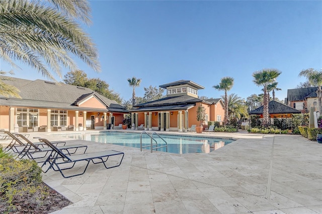 view of swimming pool featuring a gazebo and a patio