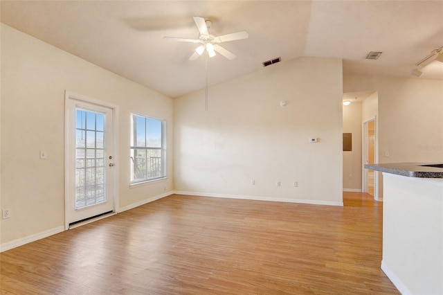 5961 Westgate Dr Unit 2034, Orlando, FL 32835 - unfurnished living room featuring lofted ceiling, light wood-type flooring, and ceiling fan