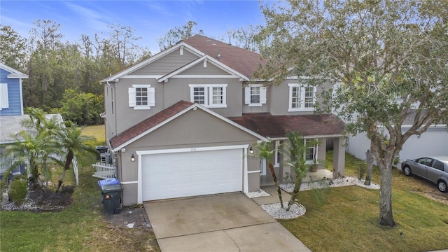 view of front facade featuring a garage and a front yard