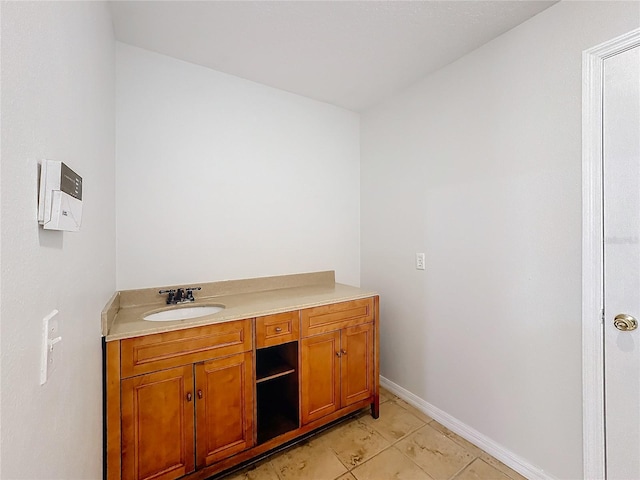 bathroom with vanity and tile patterned floors