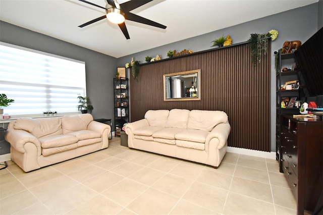 tiled living room featuring ceiling fan