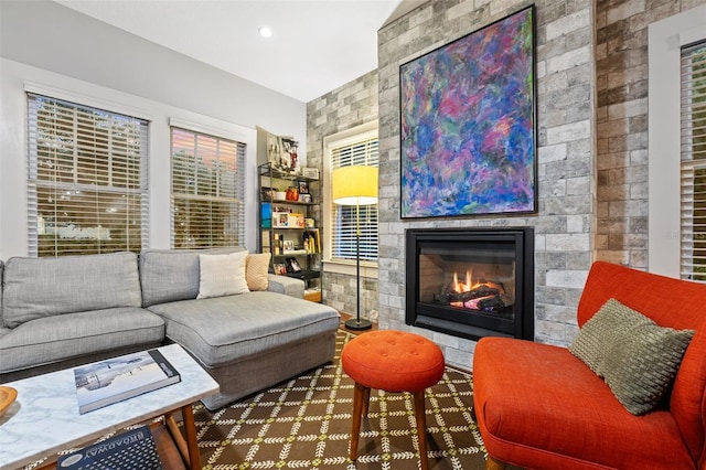 living room with a large fireplace