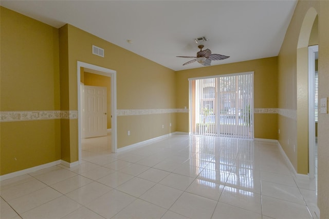 unfurnished room featuring ceiling fan and light tile patterned floors