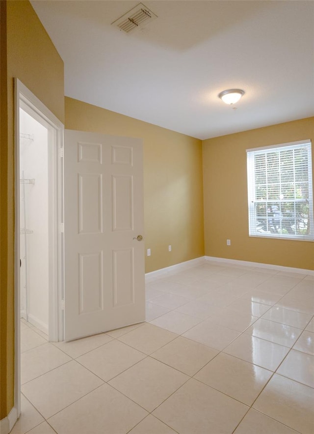 view of tiled empty room