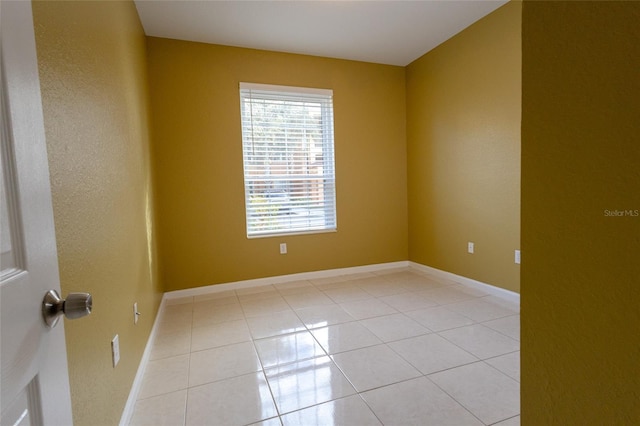 view of tiled spare room