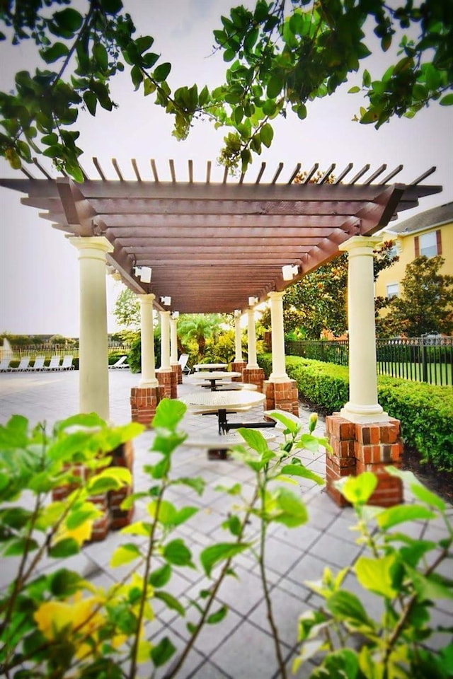 view of patio featuring a pergola