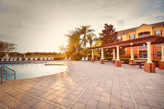 exterior space with a pergola and a patio