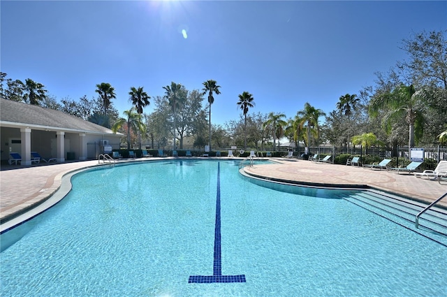 view of pool featuring a patio area