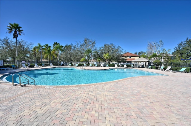 view of pool with a patio and a gazebo