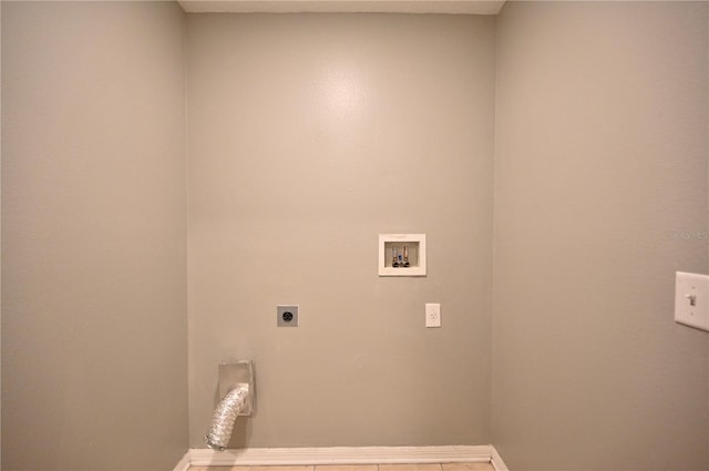 laundry room featuring electric dryer hookup and washer hookup