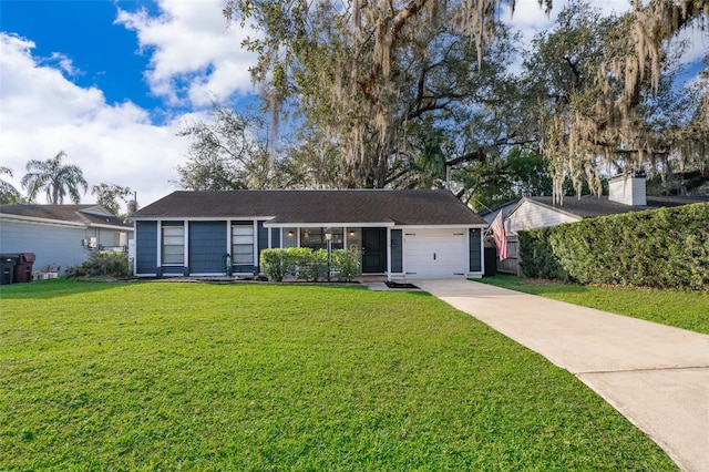 ranch-style home featuring a garage and a front lawn