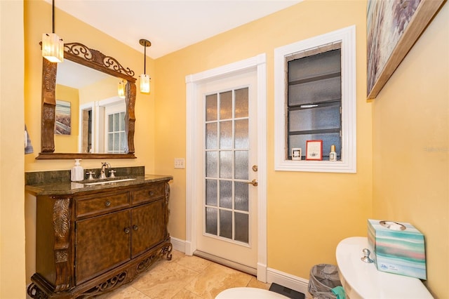 bathroom with vanity and toilet