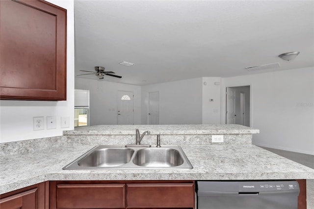 kitchen featuring ceiling fan, stainless steel dishwasher, kitchen peninsula, and sink