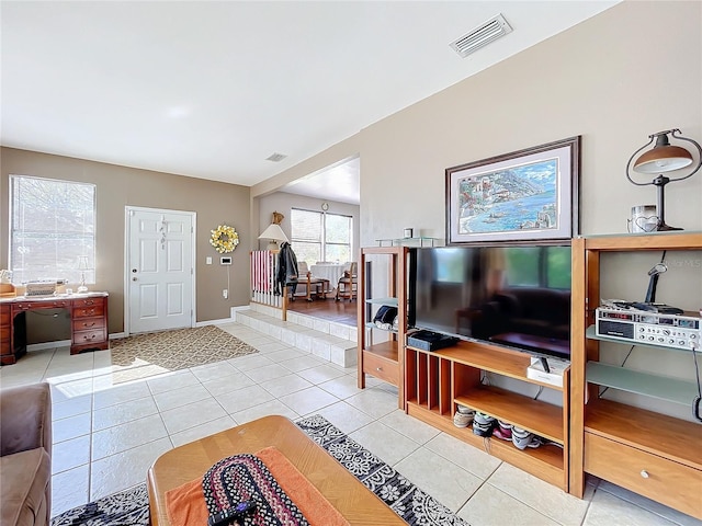 living room featuring light tile patterned flooring