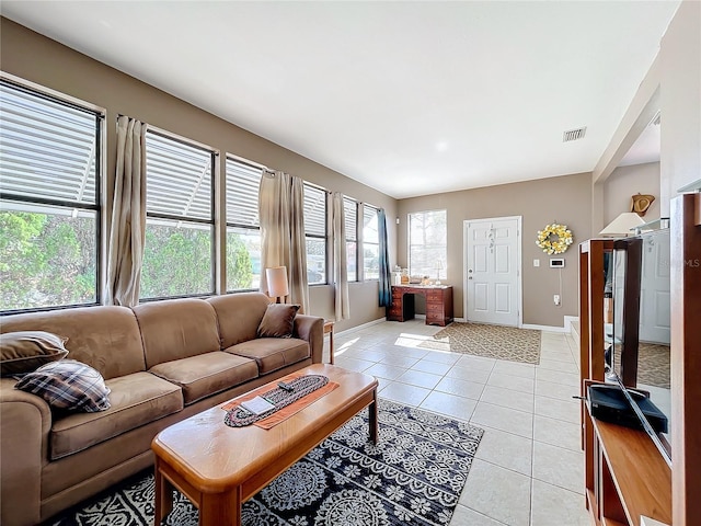 living room with light tile patterned floors