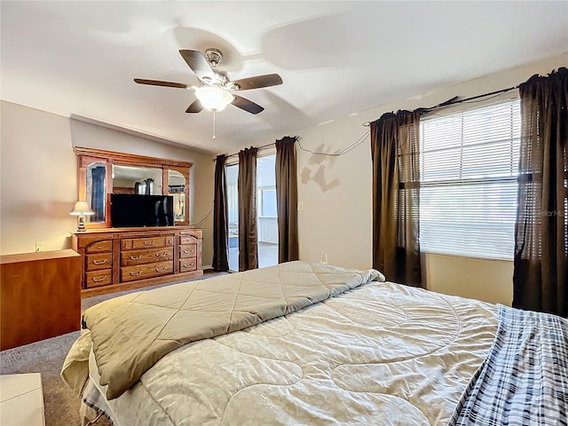 bedroom with access to exterior, carpet floors, and ceiling fan