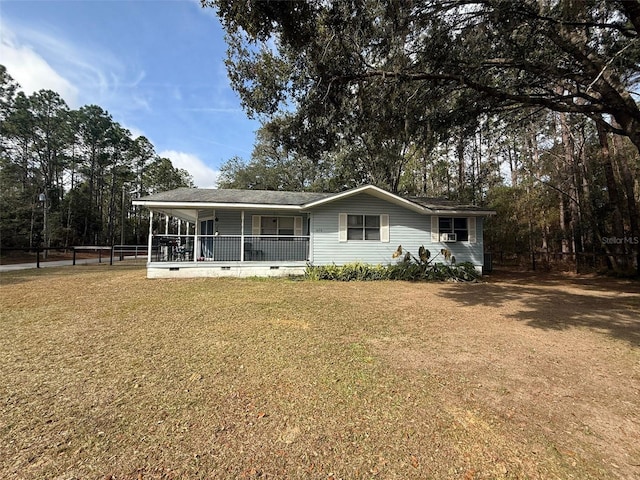 view of front of home featuring a porch and a front yard