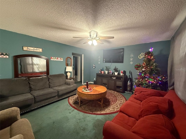 living room with carpet floors, a textured ceiling, and ceiling fan