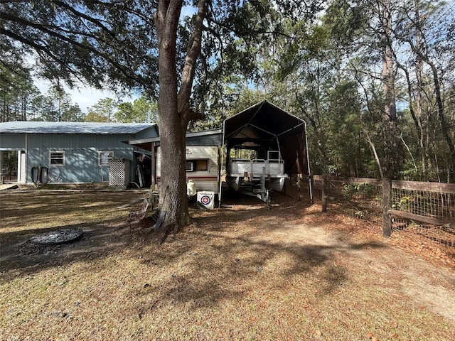 exterior space with a carport