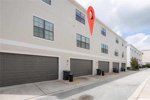 view of building exterior with a garage