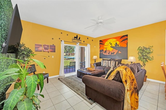 living room with light tile patterned floors and ceiling fan