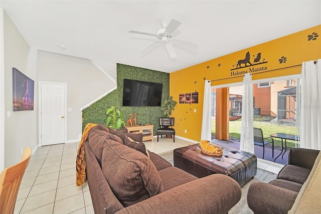 tiled living room featuring ceiling fan