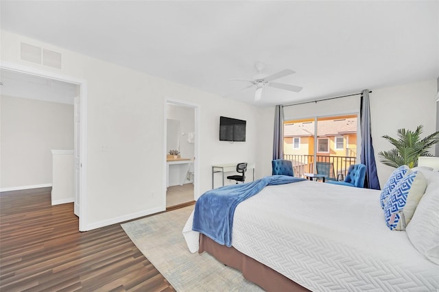 bedroom featuring dark hardwood / wood-style flooring, ensuite bath, and ceiling fan