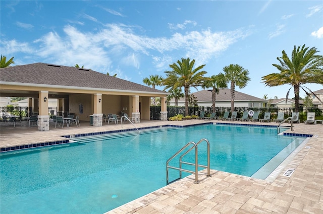 view of swimming pool with a patio area