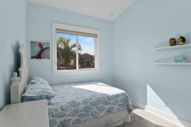 bedroom featuring hardwood / wood-style flooring